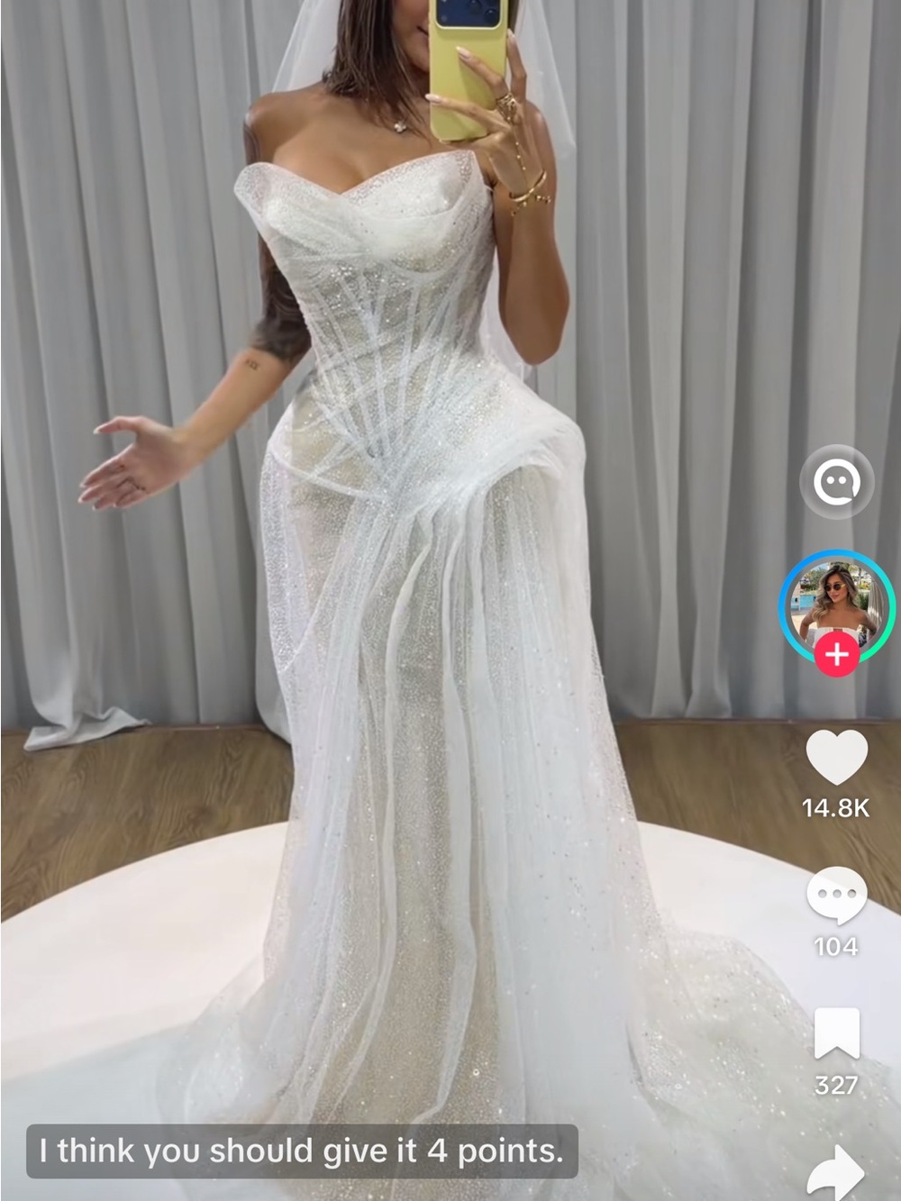 Elegant White Strapless Wedding Dress with Sheer Sparkle Draping. Free veil